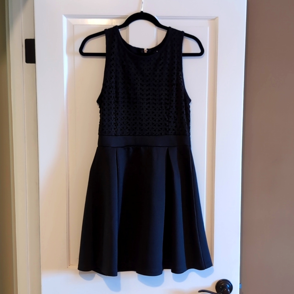 Women's black cocktail dress with cutout bodice in size medium
